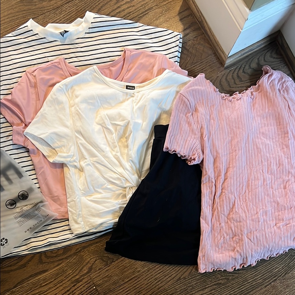 Grab bag bundle. 4 shirts and 1 black skirt